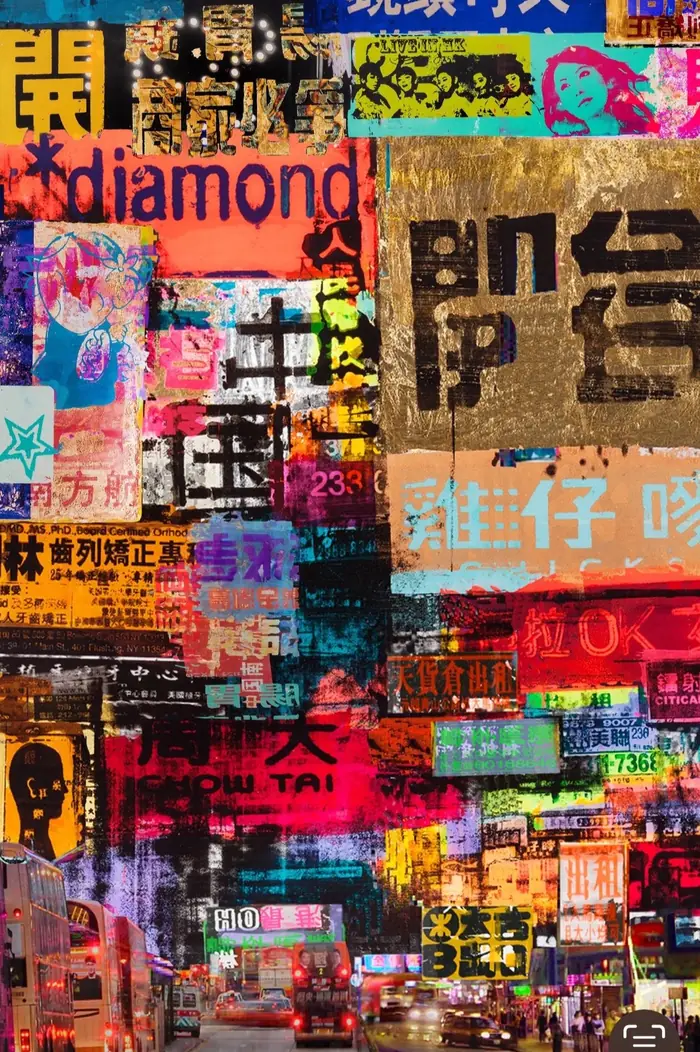 Hong Kong – A street packed with neon signs in Chinese and English.