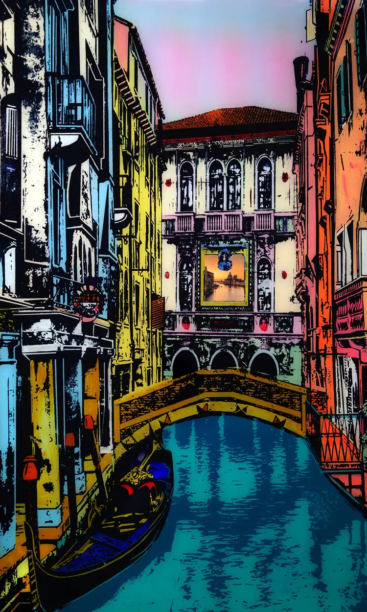 Venice – A canal with a small bridge between colourful palazzi.